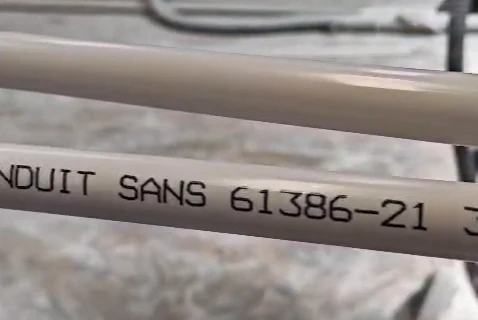 Close-up of specification text printed on PVC piping